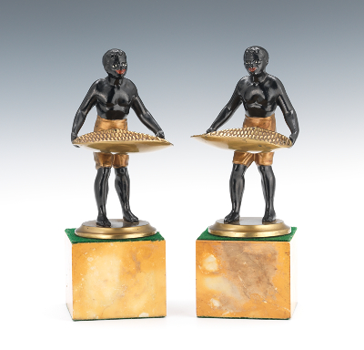Pair Blackamoors with Baskets Male figures