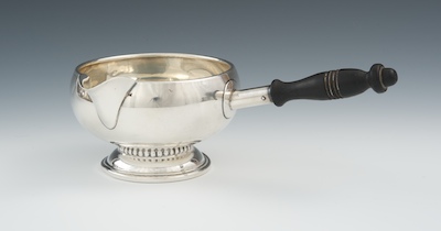 A Sterling Silver Brandy Warmer