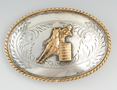 A Sterling Silver and Gold Belt Buckle