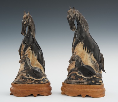 A Pair of Horn Carvings of Horses