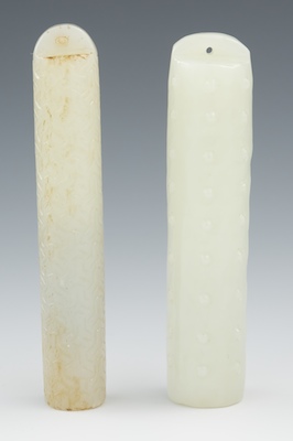 Two Carved Jade Toggles Each carved