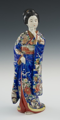 A Glazed Kutani Figure of a Bijin Apprx.