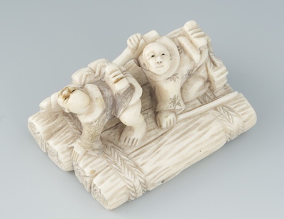 A Carved Ivory Netsuke of Two Men