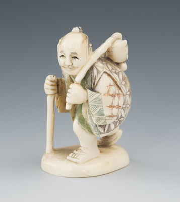 A Carved Ivory Netsuke of a Traveler 131f4b