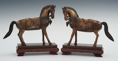 A Pair of Carved Ivory or Bone Horses