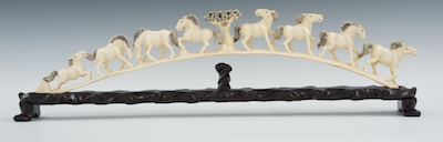 A Carved Ivory Tusk Depicting Eight