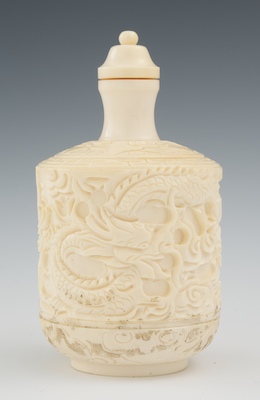 A Carved Ivory Snuff Bottle Carved in