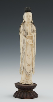 A Carved Ivory Figure of a Goddess Standing