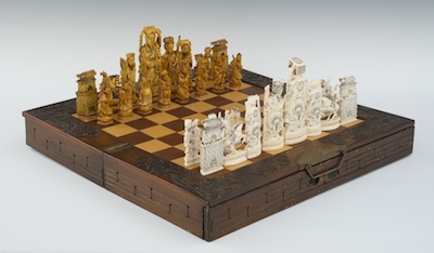 A Carved Ivory Chess Set and Game Board