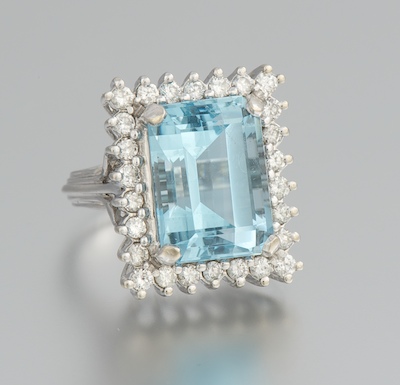 A Blue Topaz and Diamond Ring 14k