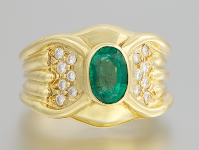 A Ladies' 18k Gold Emerald and