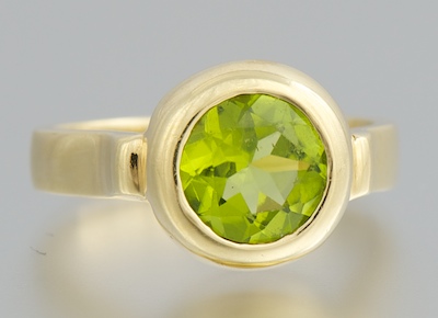 A Ladies Peridot Ring Signed R  131fe7