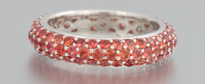 An Orange Sapphire Eternity Band