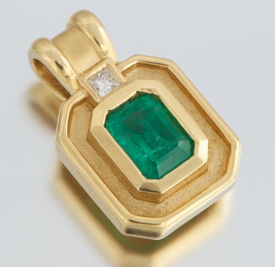 A Ladies' 18k Gold Emerald and