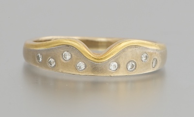 A Two Tone Gold and Diamond Band