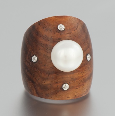 A Carved Mahogany Pearl and Diamond 132064