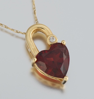 A Ladies' Garnet and Diamond Heart