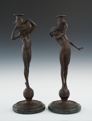 A Pair of Cast Bronze Candlesticks 13214c