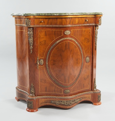 A Curved Front Cabinet with Green