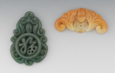Two Carved Jadeite Ornaments Containing: