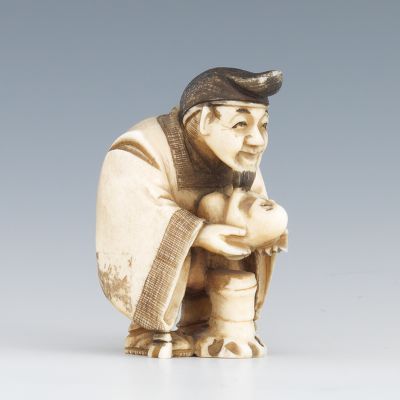 A Carved Ivory Netsuke of a Man 1349ae