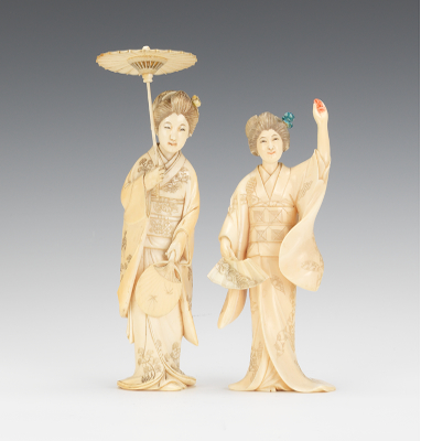 A Pair of Carved Ivory Maidens