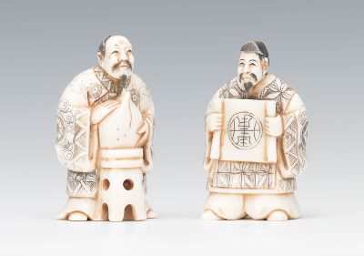 Two Carved Ivory Netsuke of Scholars