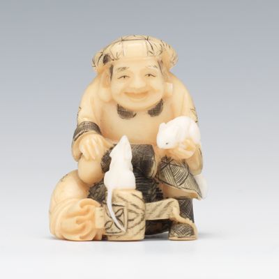 Signed Netsuke of Man with White 1349d2