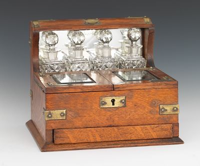 An Oak Tantalus Dressing Case Amber