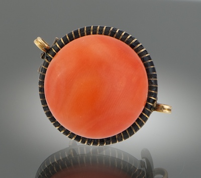 A Ladies Coral and Black Enamel Brooch