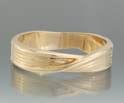A Ladies Gold Bangle Bracelet 134b30