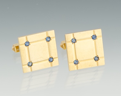 A Pair of Gold and Sapphire Cufflinks