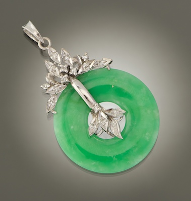 A Chinese Carved Jade Disk and