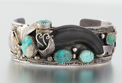 A Sterling Silver Turquoise and Claw