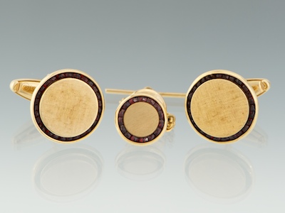 A Set of Gold and Garnet Cufflinks