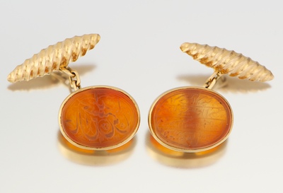 A Pair of Carved Carnelian and