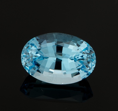 An Unmounted Blue Topaz Oval faceted