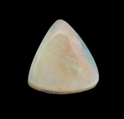 An Unmounted White Opal Cabochon