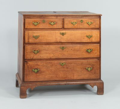 An Antique Walnut Straight Front