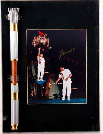 Olympic torch and Muhammad Ali autographed