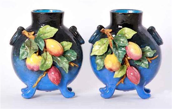 Pair ornate ceramic vases footed