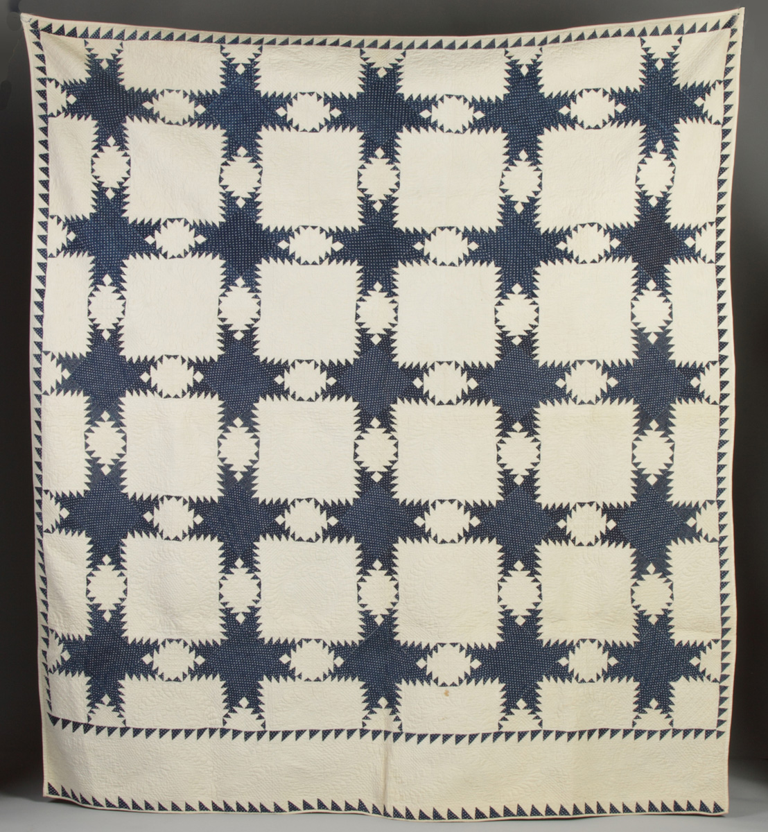 Dark Blue on White Patch Quilt Flying
