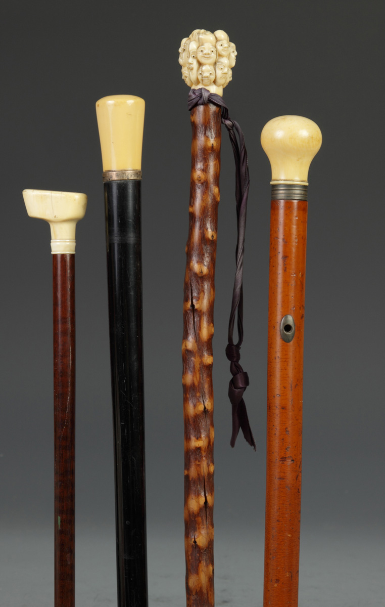 Group of 4 Ivory Handled Canes Golf
