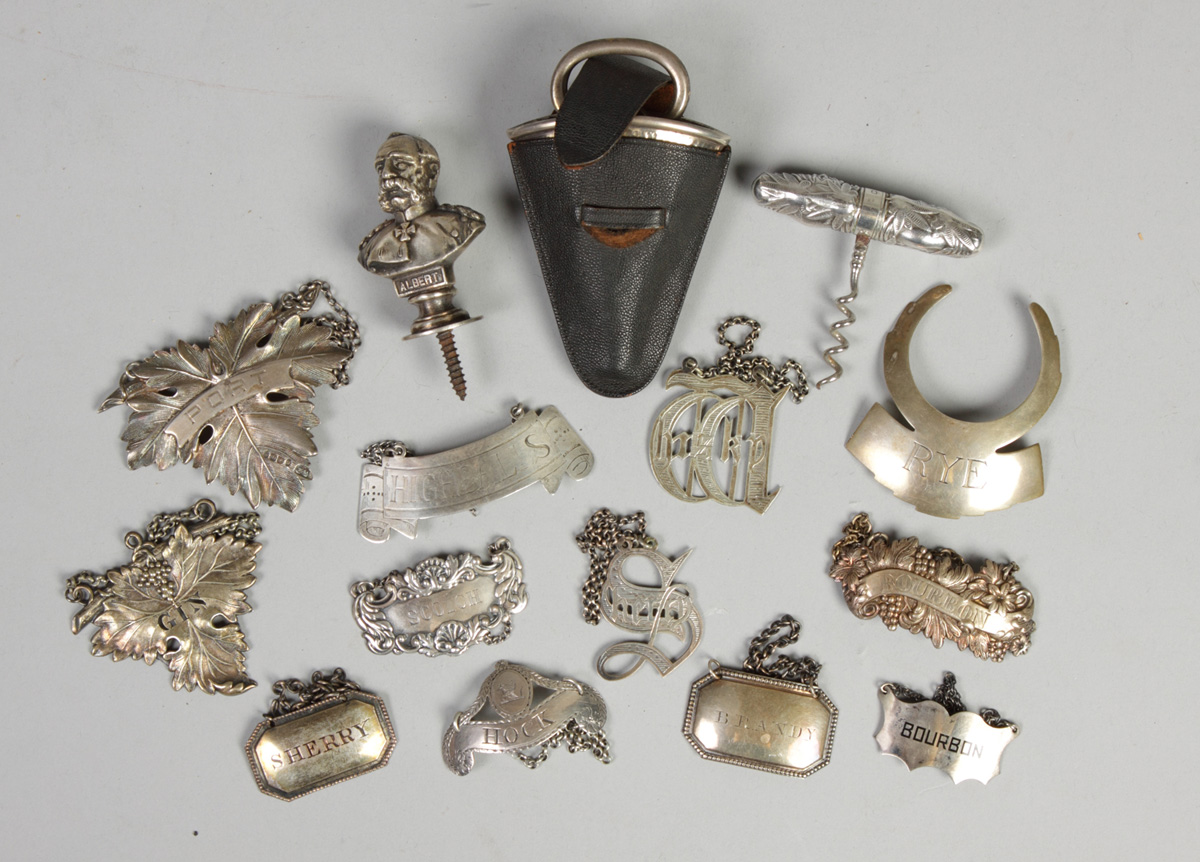 Silver wine labels corkscrews etc.