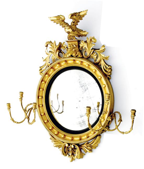 Regency style carved giltwood convex