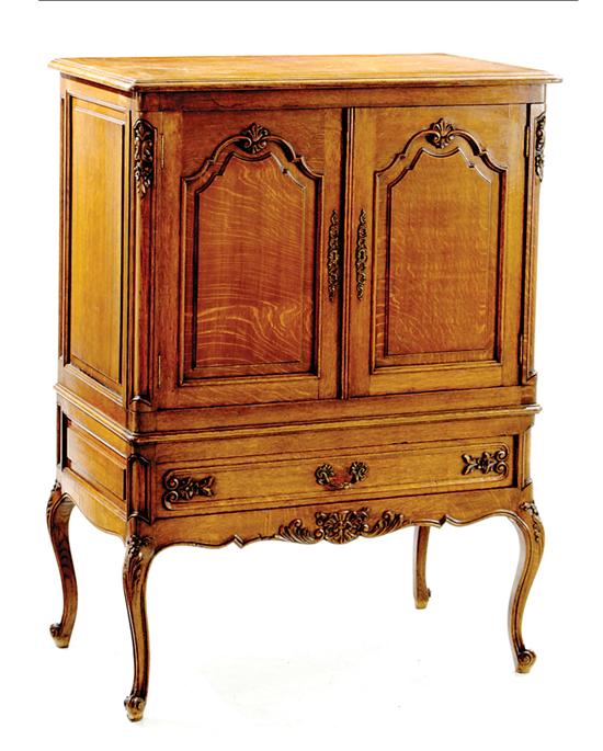 English Louis XV style oak cabinet