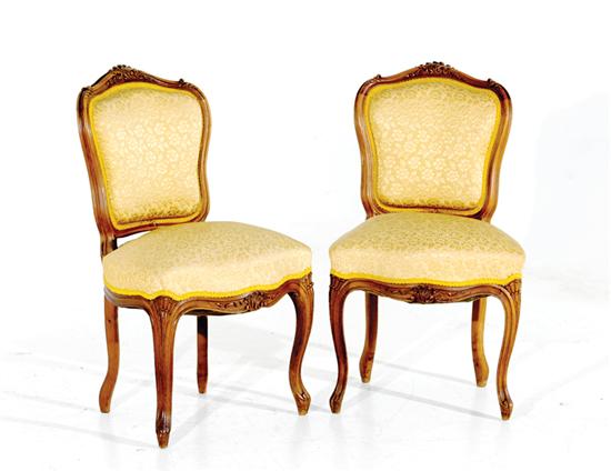 Pair Louis XV style carved fruitwood