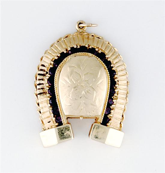 Gold and garnet horseshoe form 135456