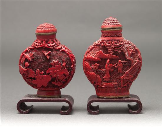 Two similar Chinese carved cinnabar 135931