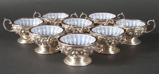 Set of eight American repousse